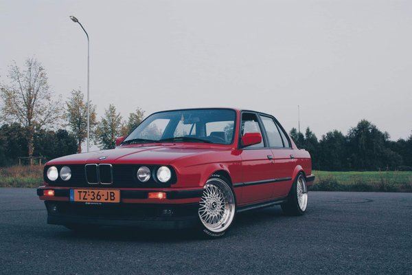 What's the Best Way to Enhance the Look of a BMW E30 with Period-Correct Alloy Wheels?